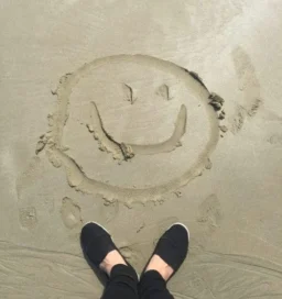 Smiley in sand